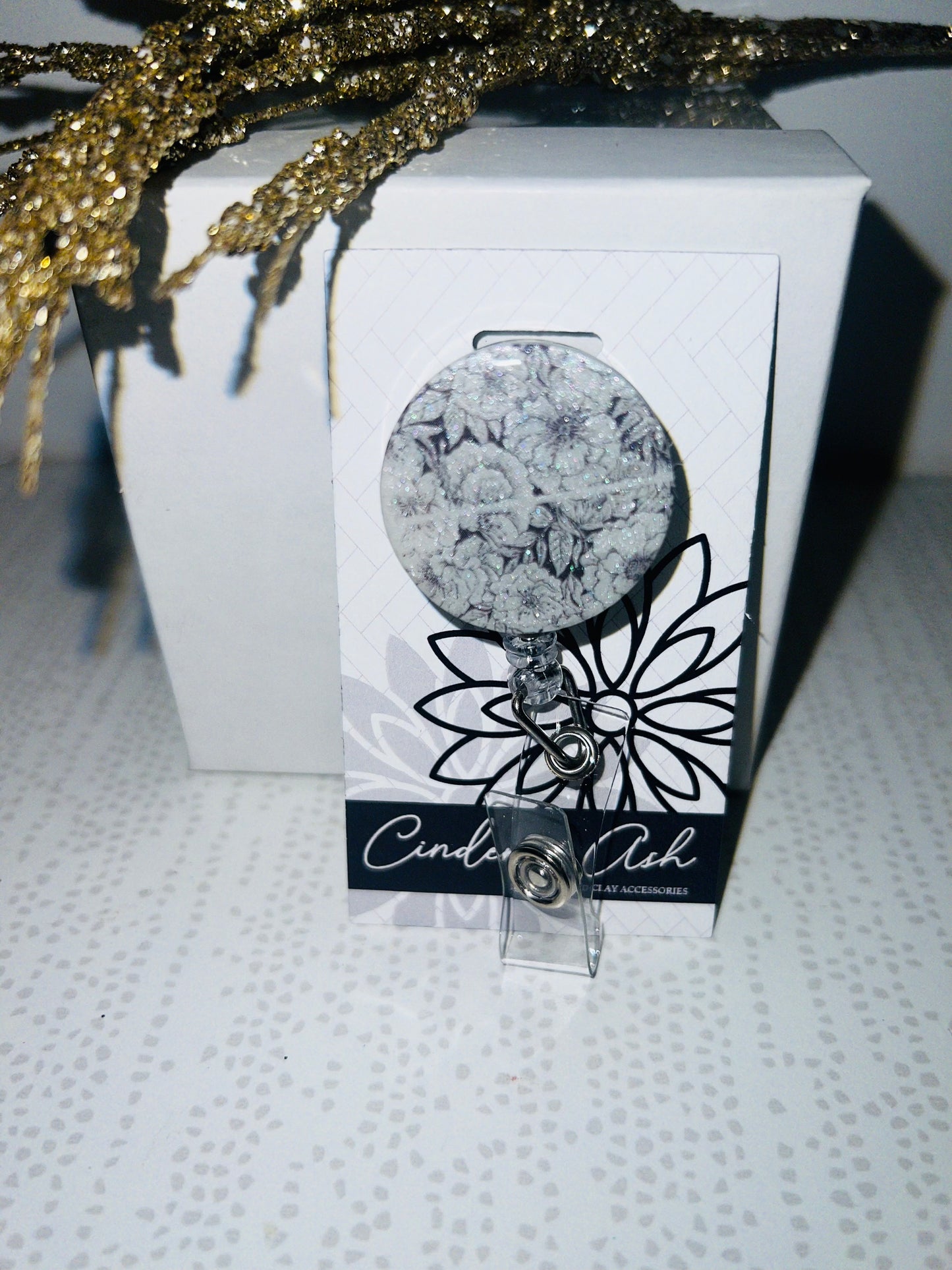 B&W FLORAL BADGE REEL