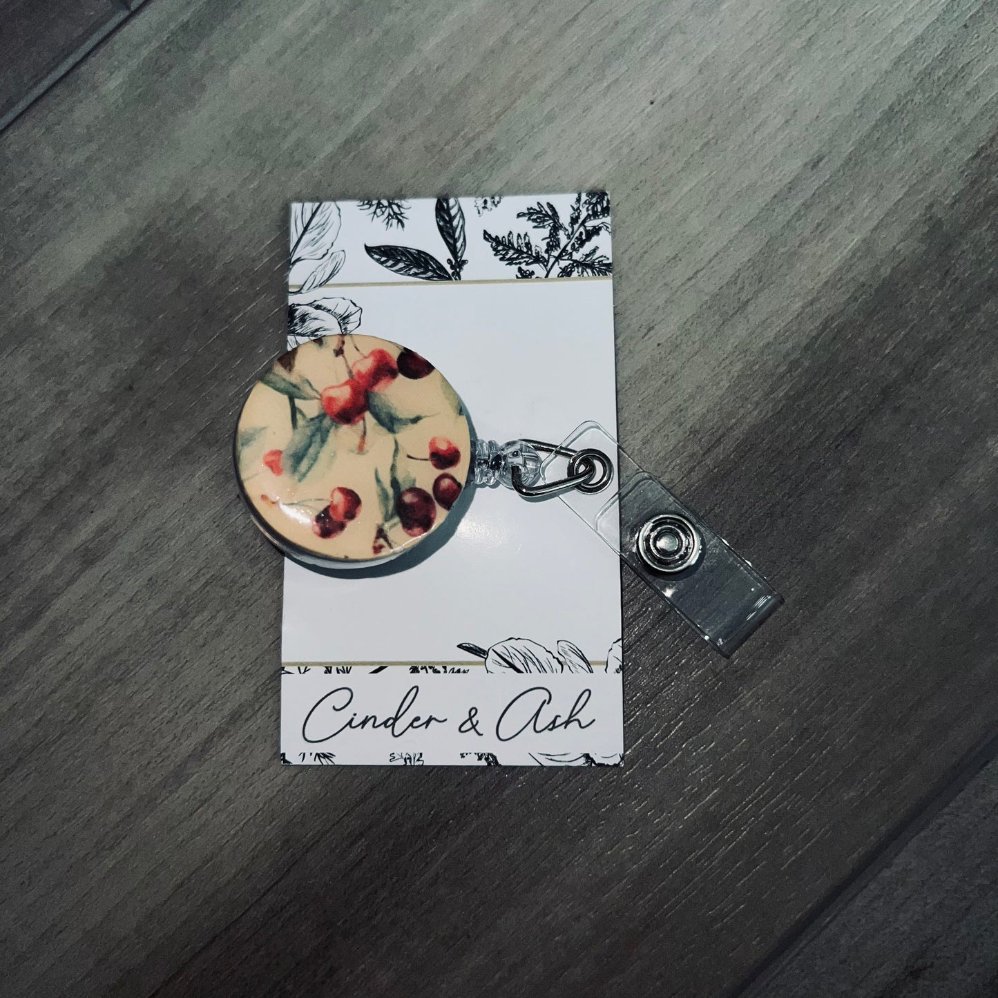 CHERRY BADGE REEL - cinder.and.ash